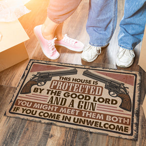 This House Is Protected by the Good Lord and a Gun Doormat